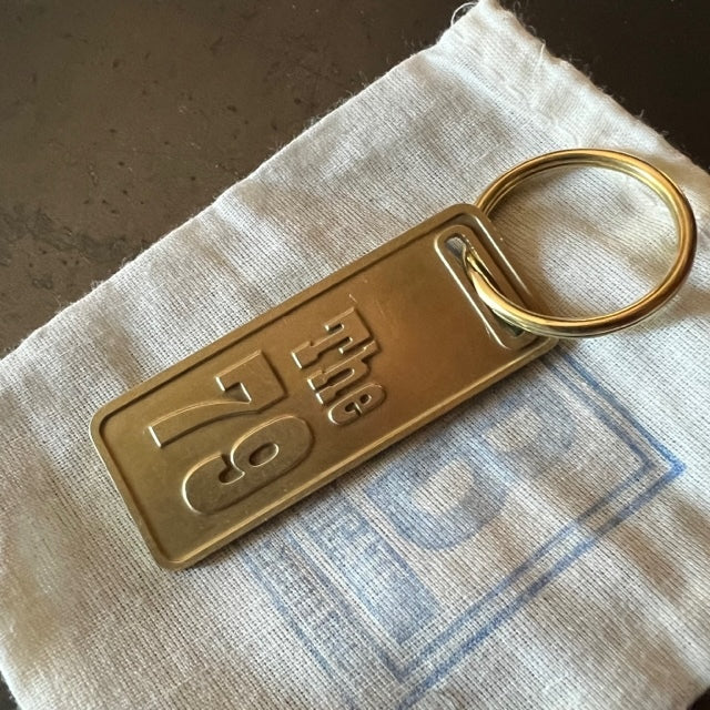 The "THE" Edition brass keychain. 1973 - 1991 Year/Design The 79