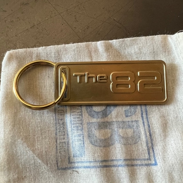 The "THE" Edition brass keychain. 1973 - 1991 Year/Design The 82