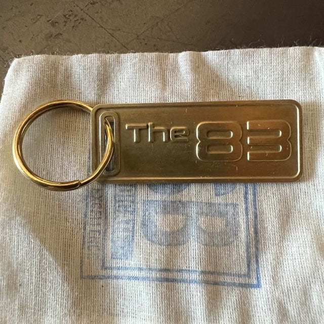 The "THE" Edition brass keychain. 1973 - 1991 Year/Design The 83