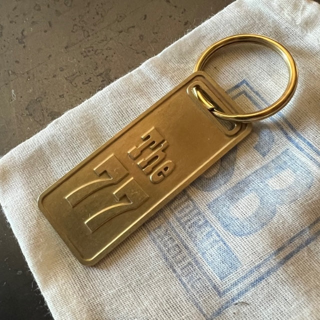 The "THE" Edition brass keychain. 1973 - 1991 Year/Design The 77