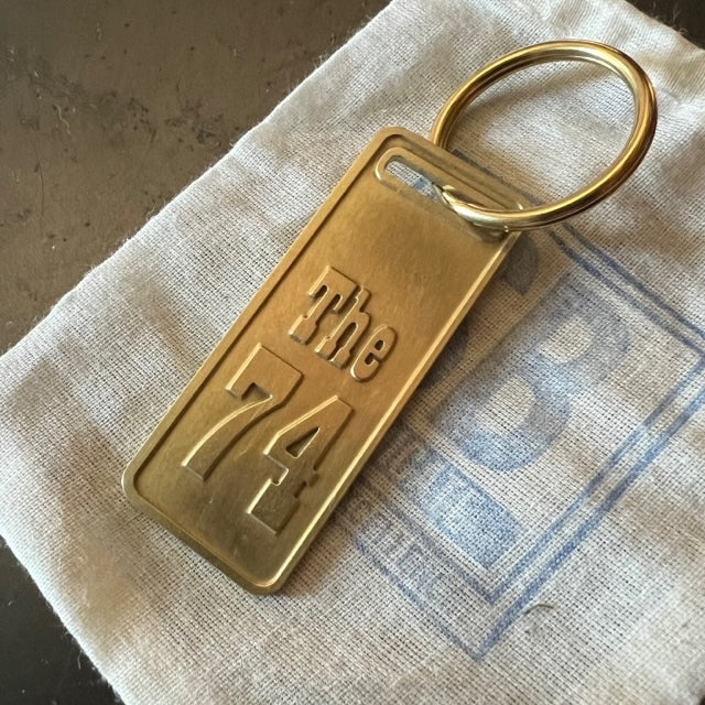 The "THE" Edition brass keychain. 1973 - 1991 Year/Design The 74