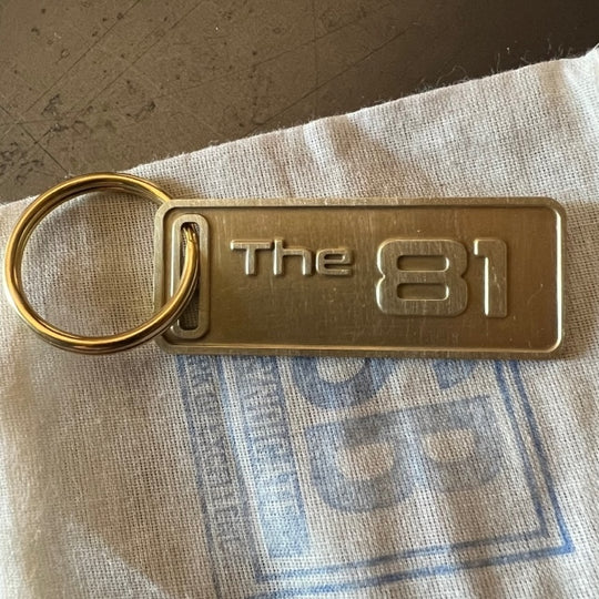 The "THE" Edition brass keychain. 1973 - 1991 Year/Design The 81