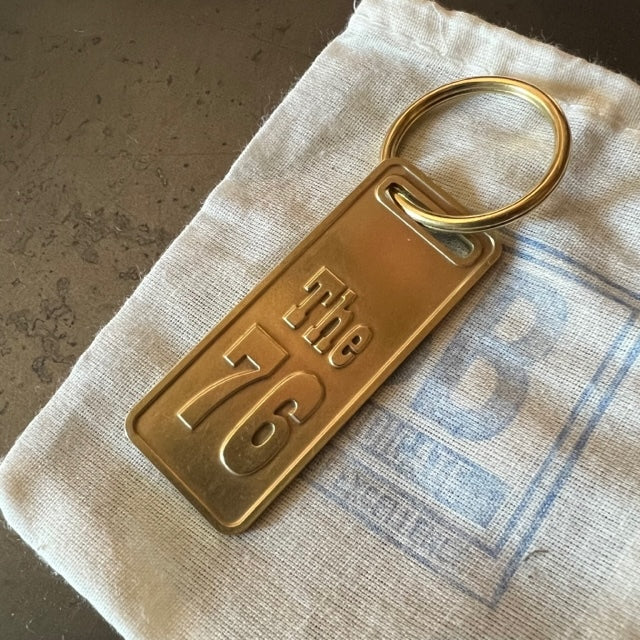 The "THE" Edition brass keychain. 1973 - 1991 Year/Design The 76