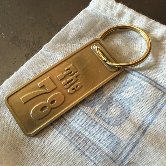 The "THE" Edition brass keychain. 1973 - 1991 Year/Design The 78