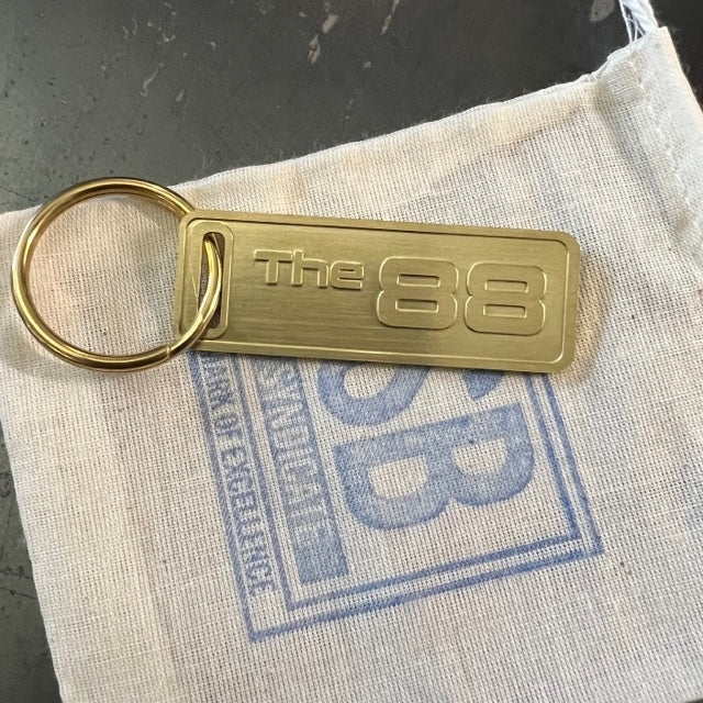 The "THE" Edition brass keychain. 1973 - 1991 Year/Design The 88