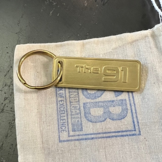 The "THE" Edition brass keychain. 1973 - 1991 Year/Design The 91