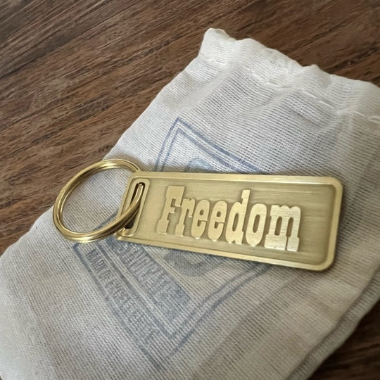 The "THE" Edition brass keychain. 1973 - 1991